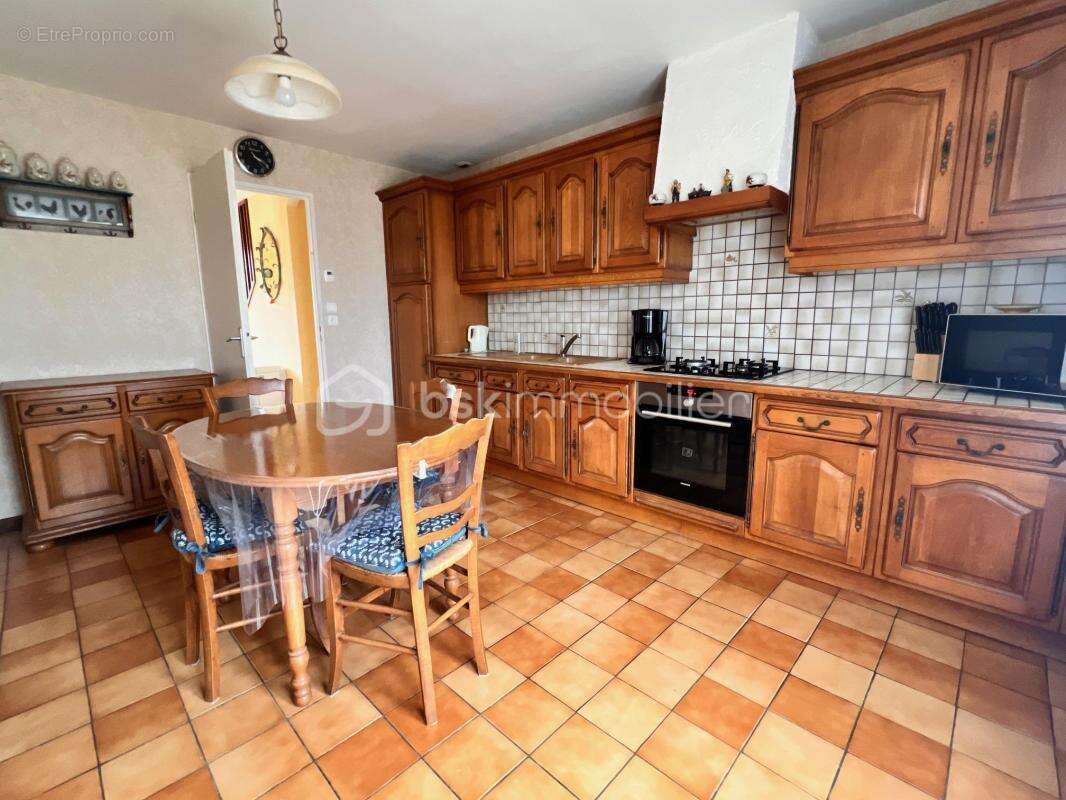 Maison familiale 4 chambres – 118 m² habitables – Sous-sol complet de 87 m² – En impasse, au calme - photo 4