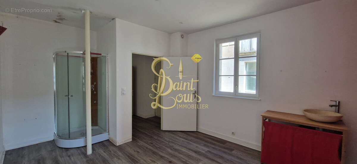 Immeuble de rapport 2 appartements 1 local commercial libre - photo 5