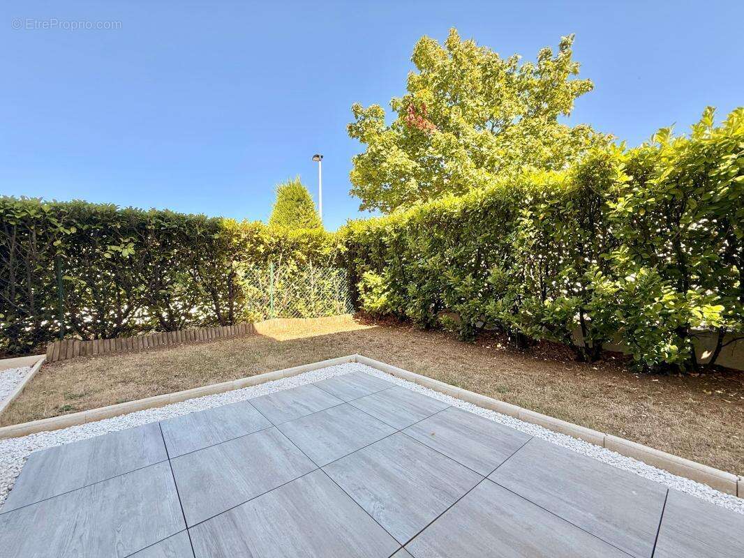 Appartement T3 avec jardin privatif et place de stationnement - photo 13