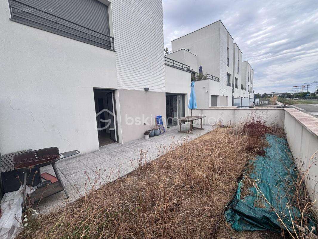 Appartement T2 en ré de jardin au pied du tramway avec stationnement - photo 2