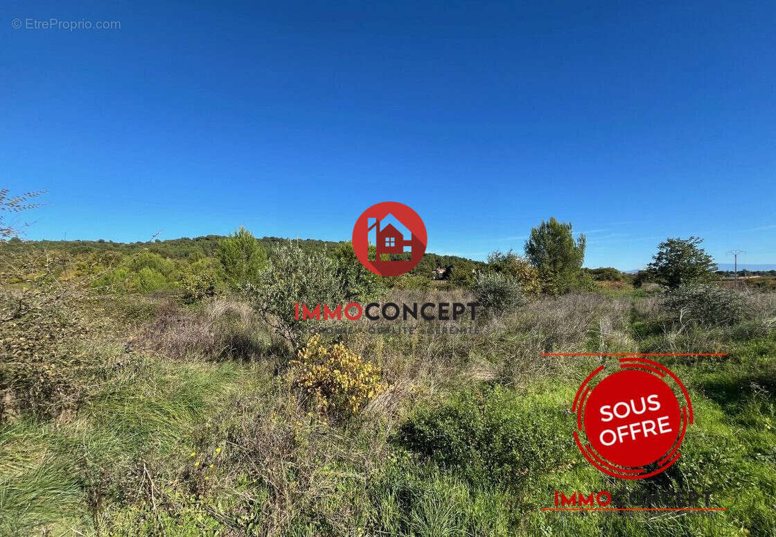 Terrain à LAUDUN-L'ARDOISE