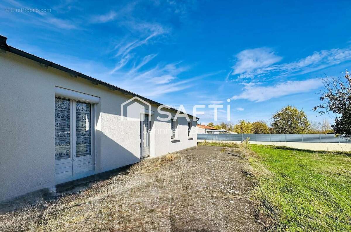 Photo 2 - Maison à LA CHAPELLE-SAINT-LAURENT