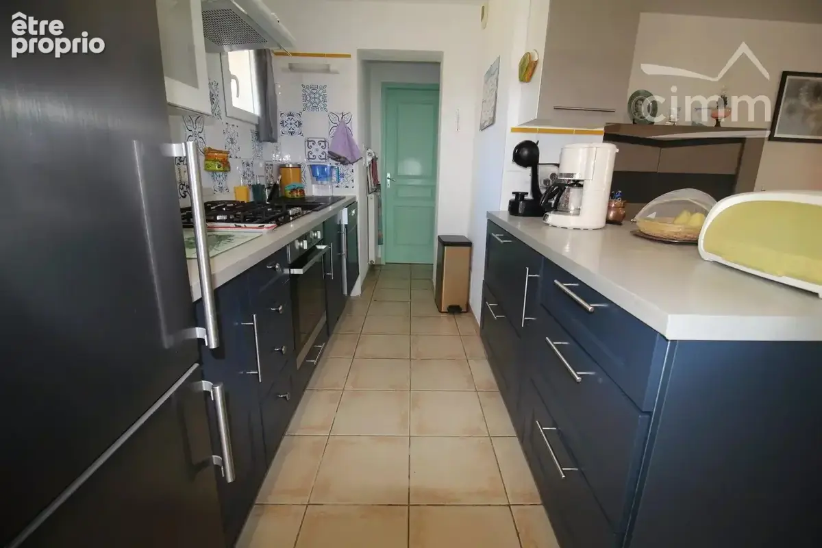 A vendre maison avec garage et jardin - photo 5