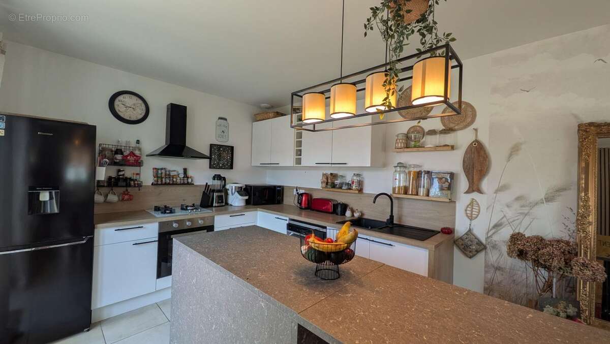 Appartement t3 rez-de-jardin 68 m² entièrement rénové - photo 6