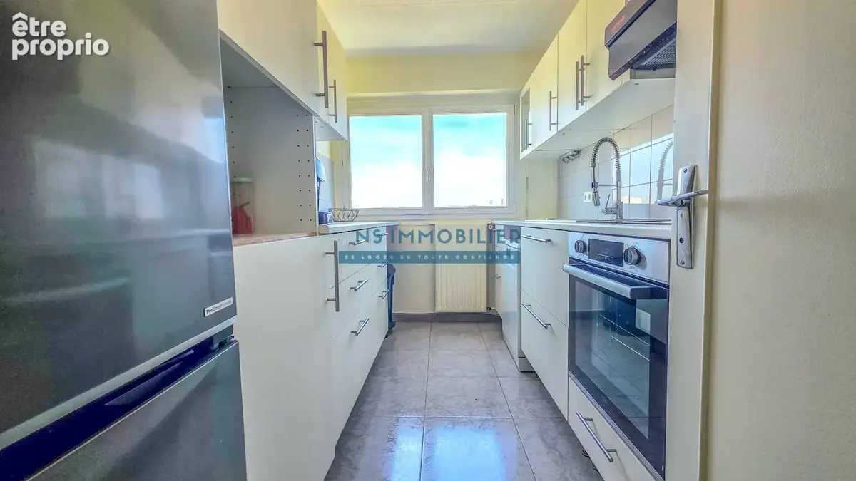 Appartement F4 75m2 + Cave + Parking - photo 6