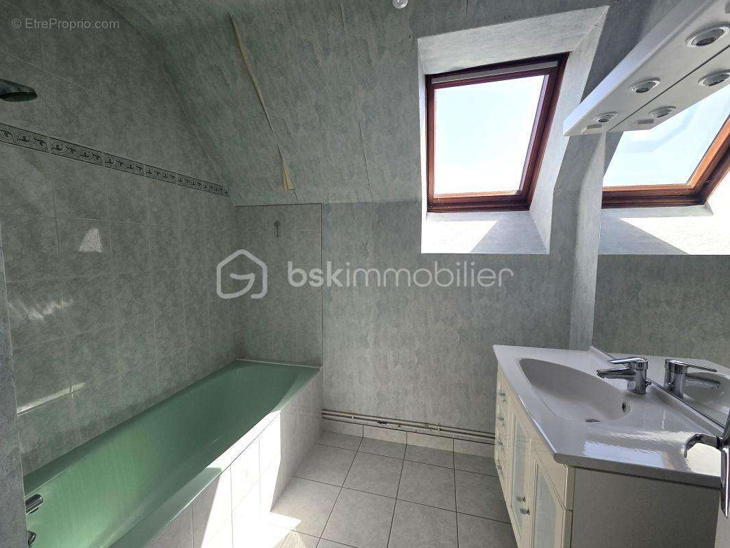 Lorient – Maison familiale de 124,50 m² avec vie de plain-pied, quatre chambres, Garage et Jardin - photo 11