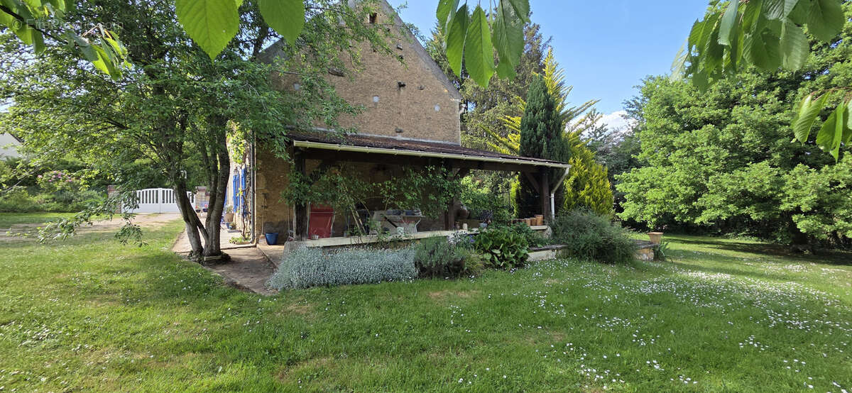 Maison à MENOU