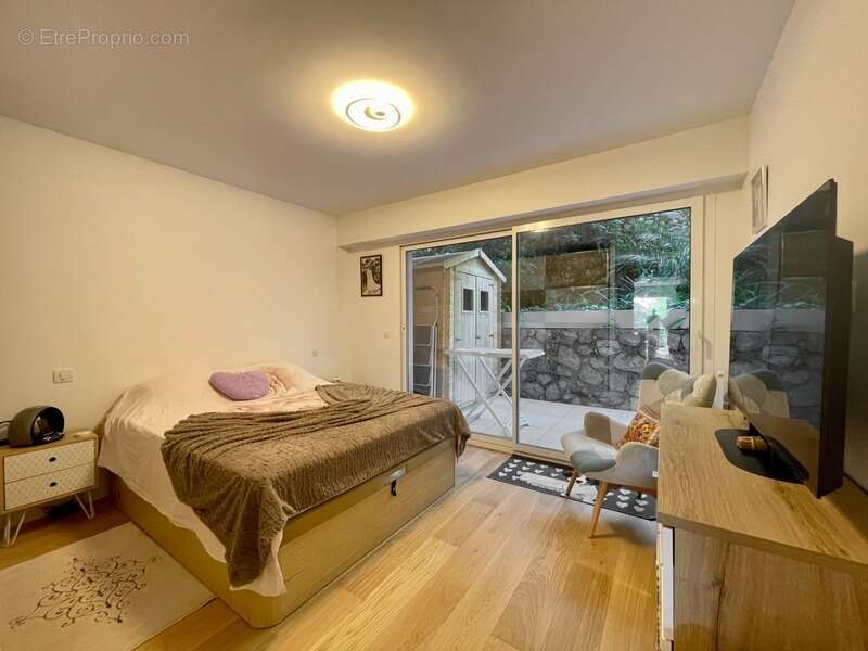 Appartement en rez-de-jardin, au calme, rénové - photo 8