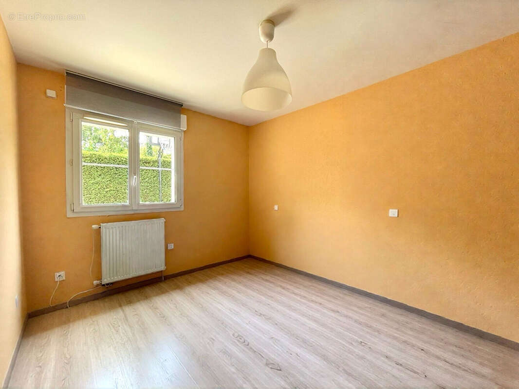 Appartement en rez-de-jardin avec garage, parking, cave, terrasse et jardin - photo 13