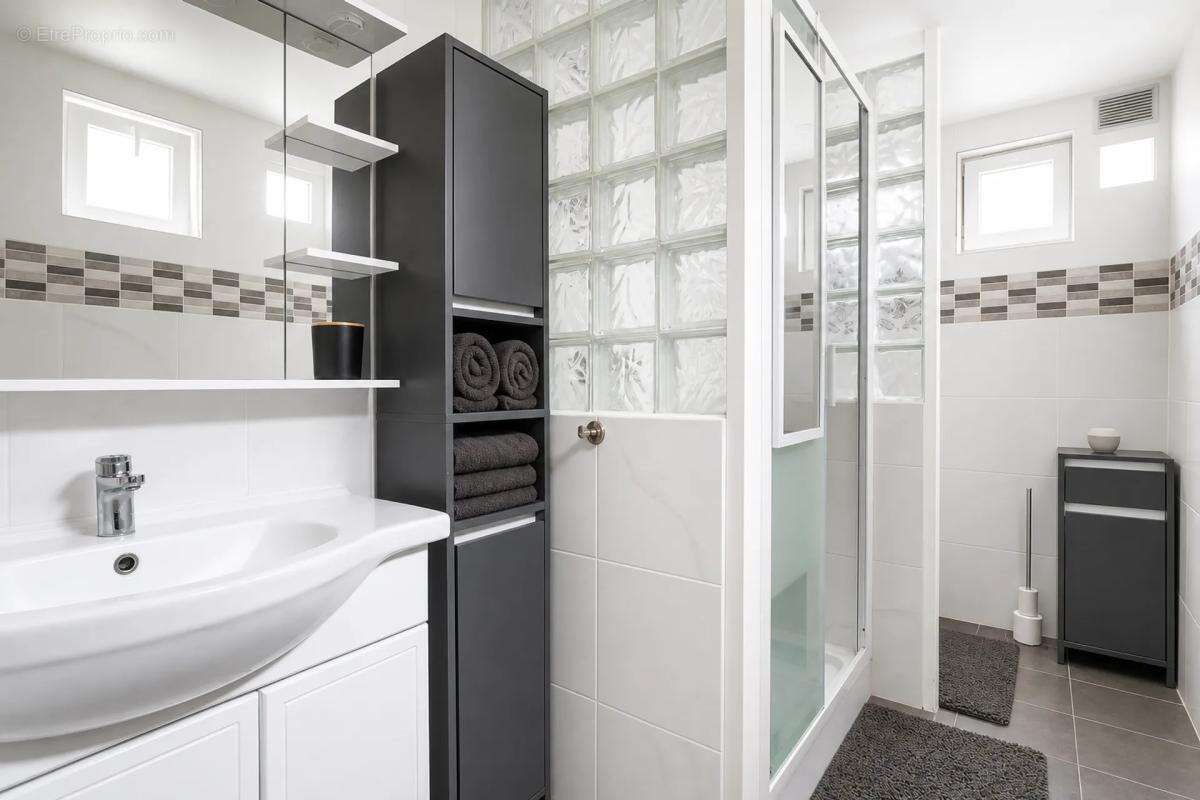 Maison de 6 pièces de 142 m² située à Tourcoing - photo 5