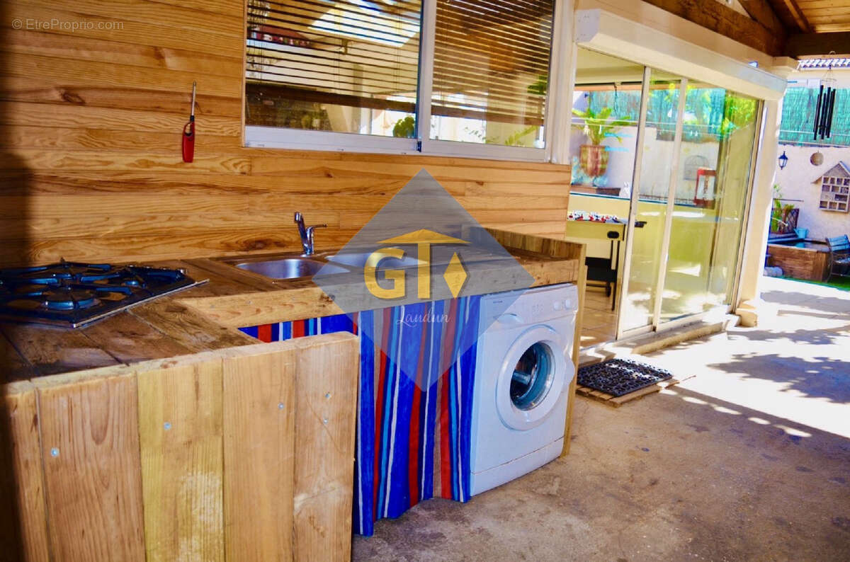 Maison à LAUDUN-L'ARDOISE