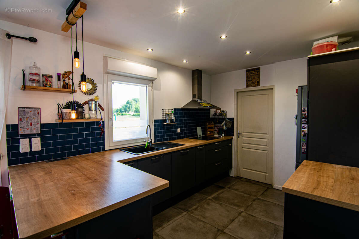 Maison à MOGNEVILLE