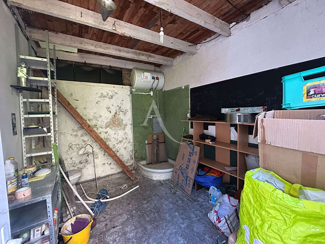 Appartement avec 2 caves et une dependance - photo 6