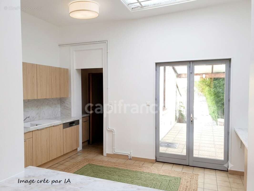 Maison de 1930 pleine de charme avec jardin, terrasse couverte et 4 chambres à Valenciennes (59) - photo 10