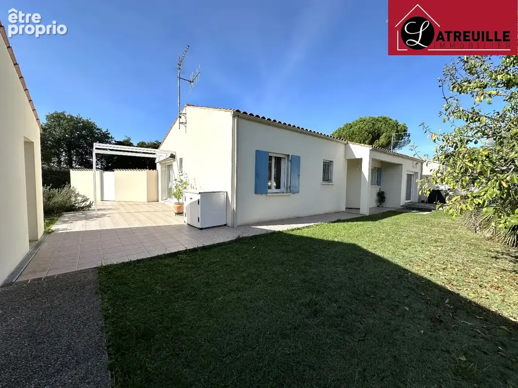 Maison de plain-pied de 101 m² à Tesson avec jardin et garage - photo 1