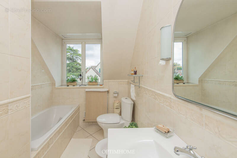 EXCLUSIVITÉ - Maison familiale avec jardin arboré + double garage - photo 28
