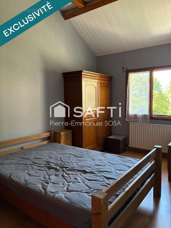 Maison 90 m² à Belmont-Luthezieu  - photo 7