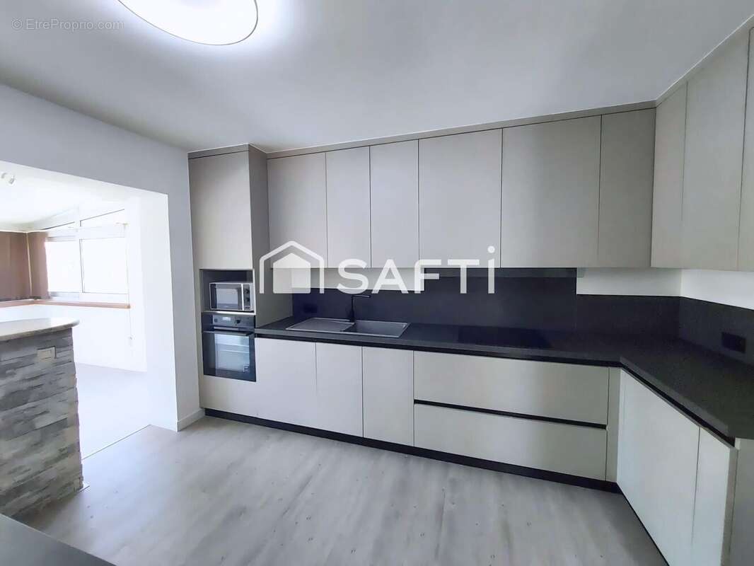 Maison 128 m² à Saint-Louis  - photo 4