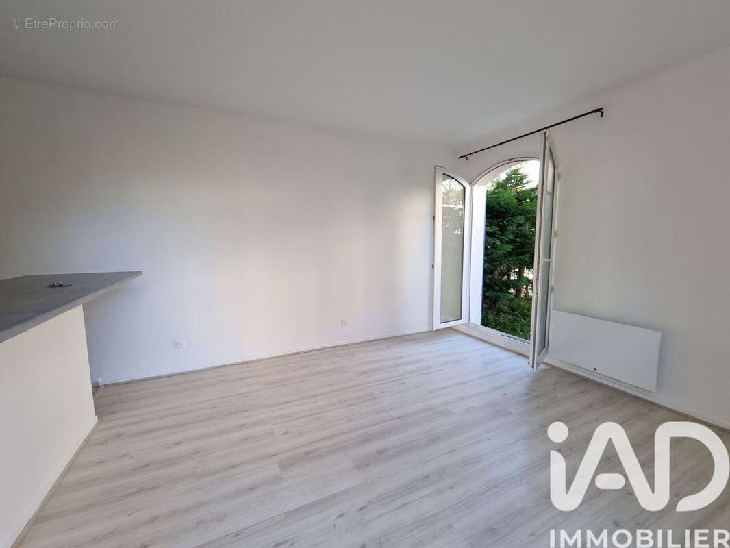 Photo 4 - Appartement à VOISINS-LE-BRETONNEUX