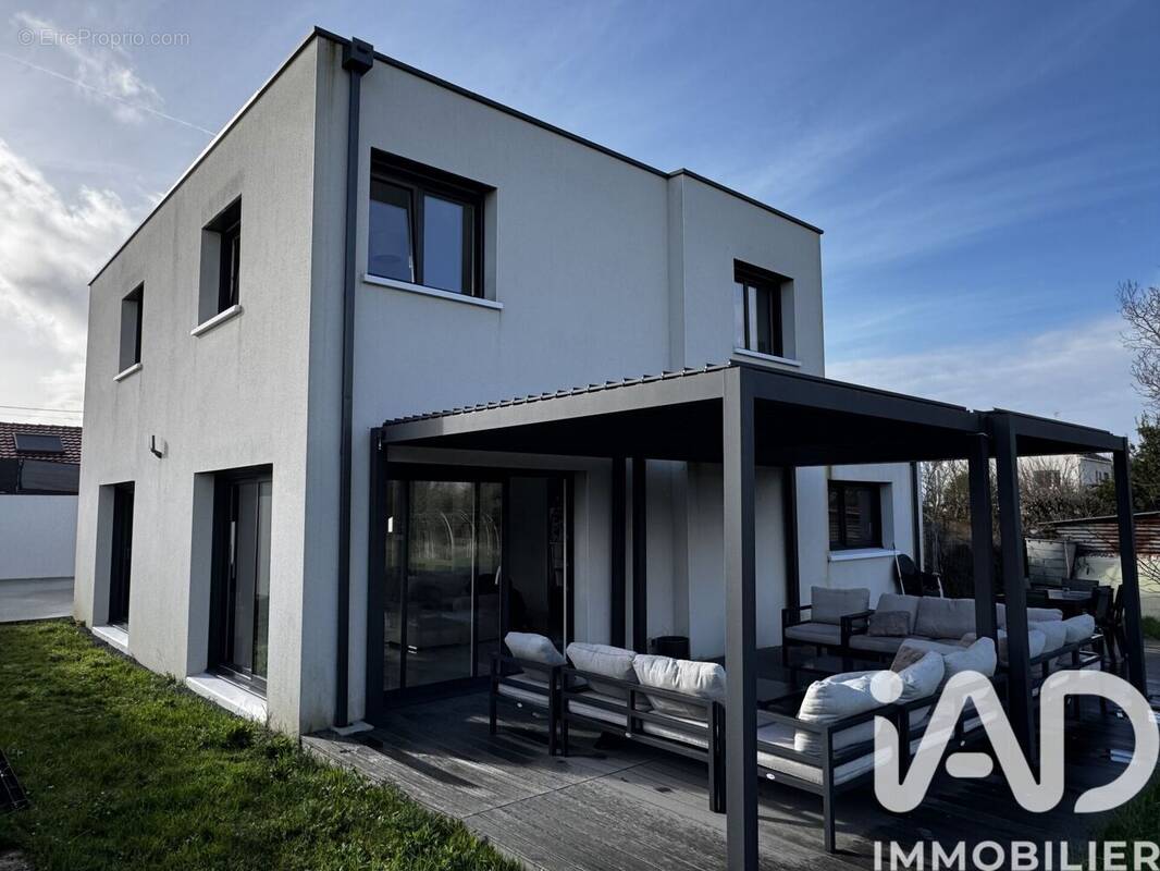 Photo 1 - Maison à BOUGUENAIS
