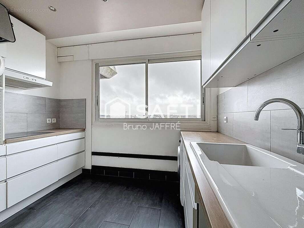 Photo 3 - Appartement à PARIS-15E