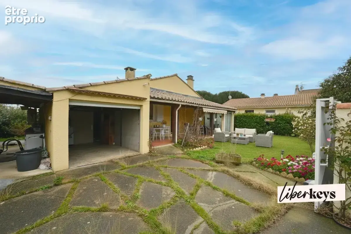 Garons- maison plain pied - 2 chambres- veranda- garage - photo 1
