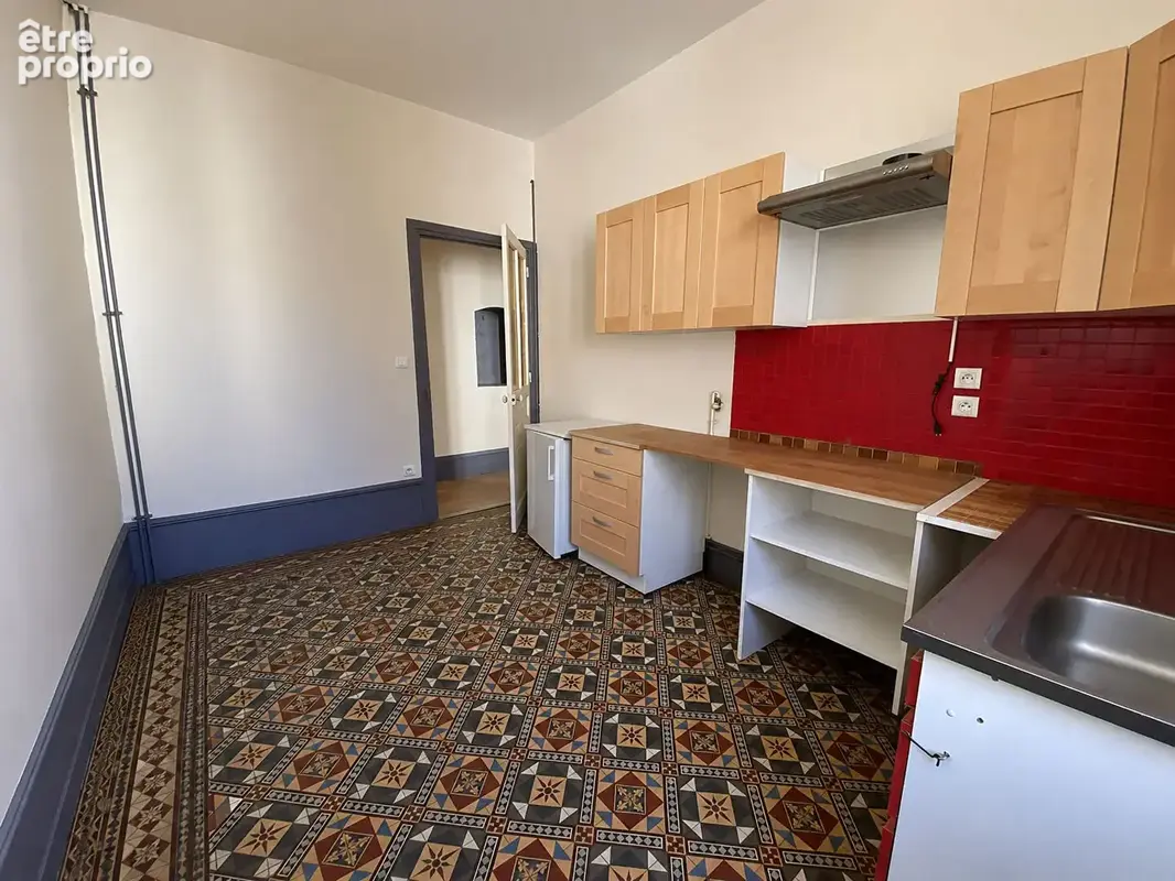 Centre-ville - Appartement de caractère à fort potentiel - photo 2