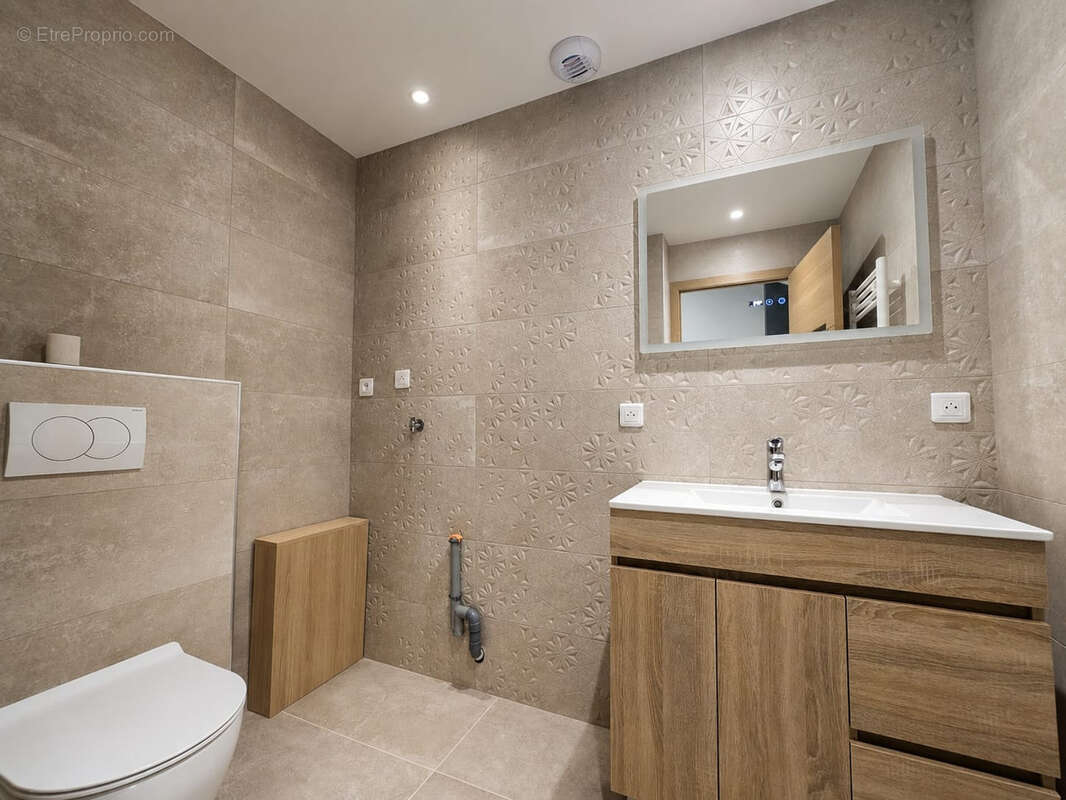 A vendre appartement duplex T4 climatisé centre-ville BELLEY. - photo 6