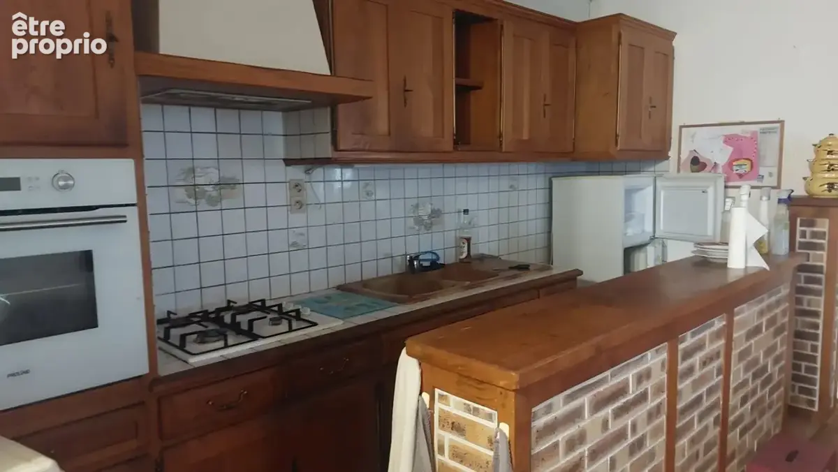 Local commercial avec logement - photo 2