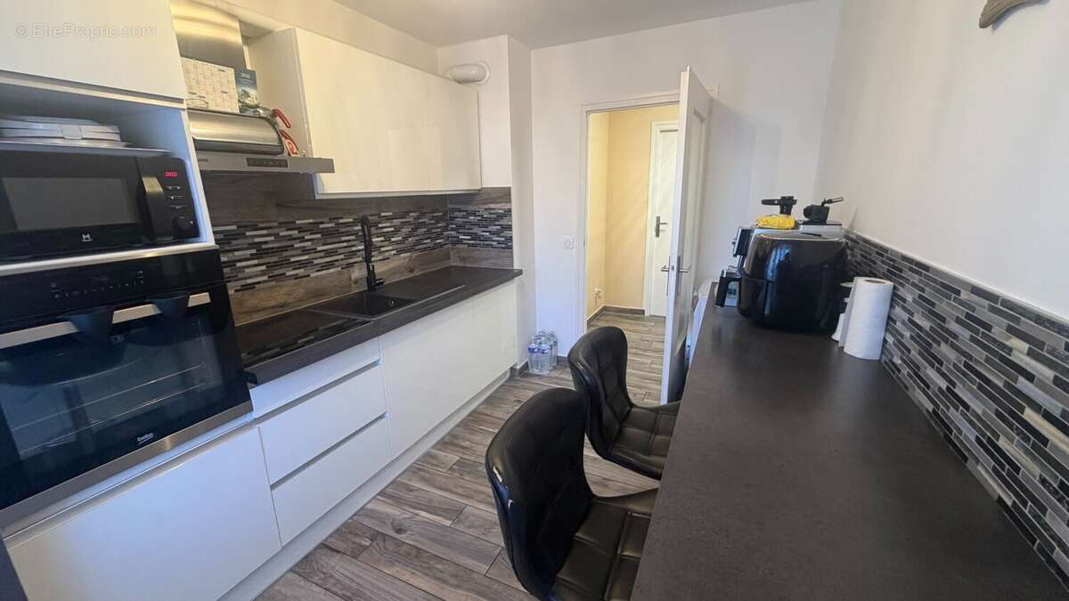 Appartement T3 a vendre a Annemasse  Cuisine équipée indépendante - Appartement à ANNEMASSE