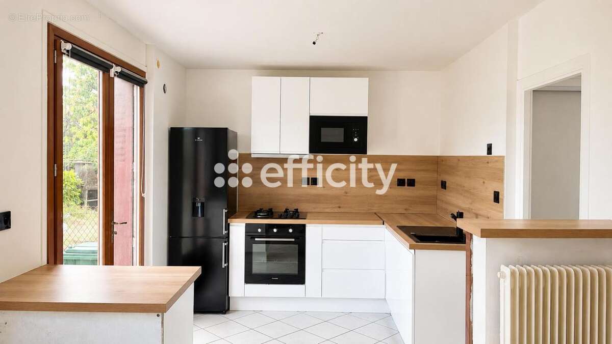 Maison 74 m² à Aulnat  - photo 7