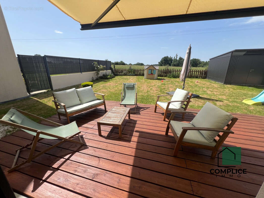 Maison 90 m² à Saint-Etienne-De-Montluc  - photo 2