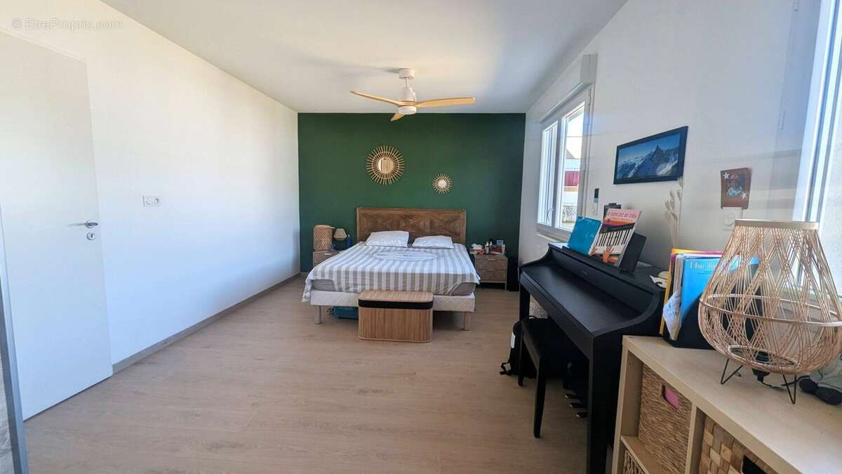 Maison 87 m² à Saint-Etienne-De-Crossey  - photo 5