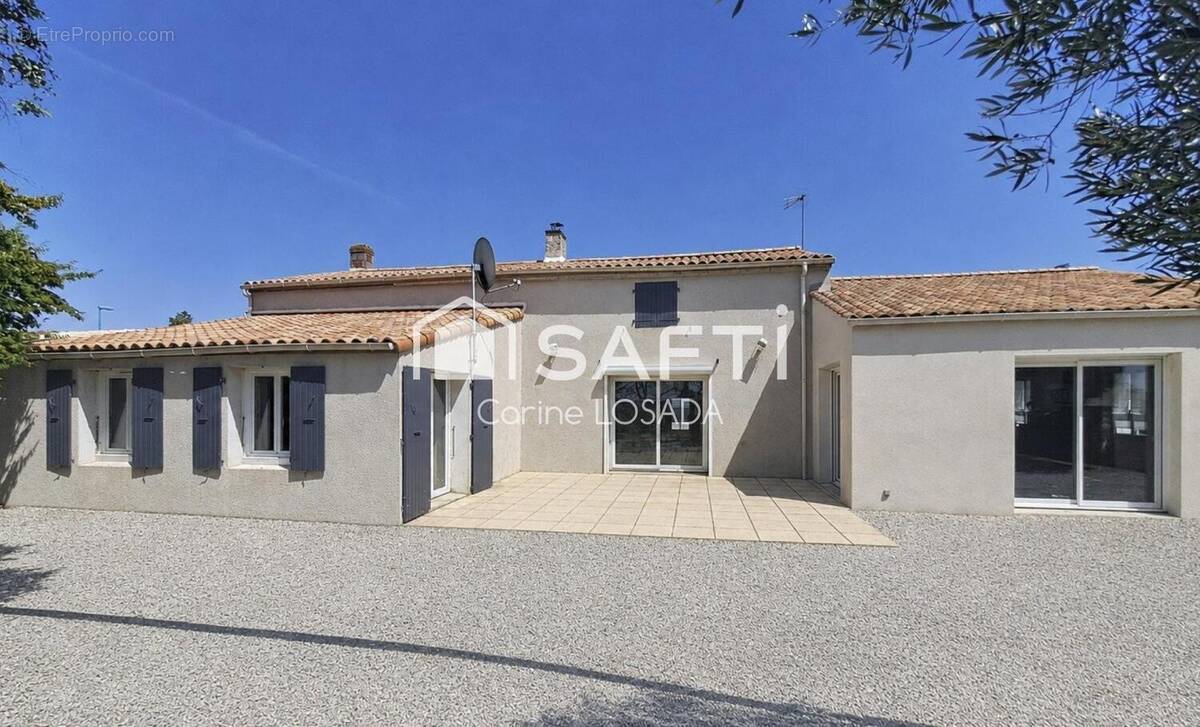 Photo 1 - Maison à LES MAGNILS-REIGNIERS
