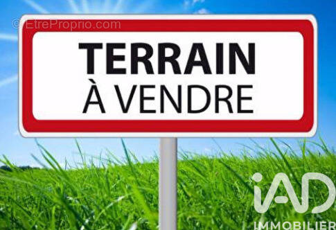 Photo 1 - Terrain à LE THUIT-SIGNOL