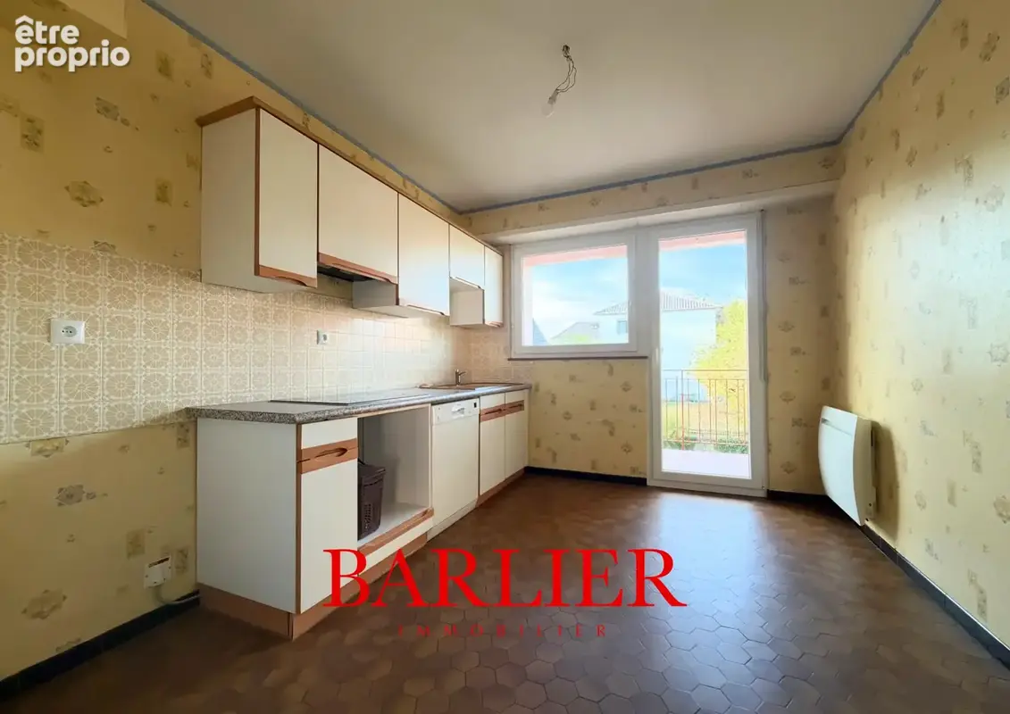 Appartement 4 pièces de 92 m2 avec garage, caves et jardin. - photo 7