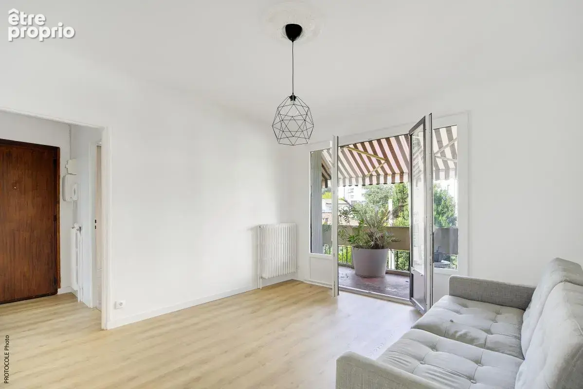 Appart T3 traversant 59 m², deux terrasses, cave et parking - photo 6