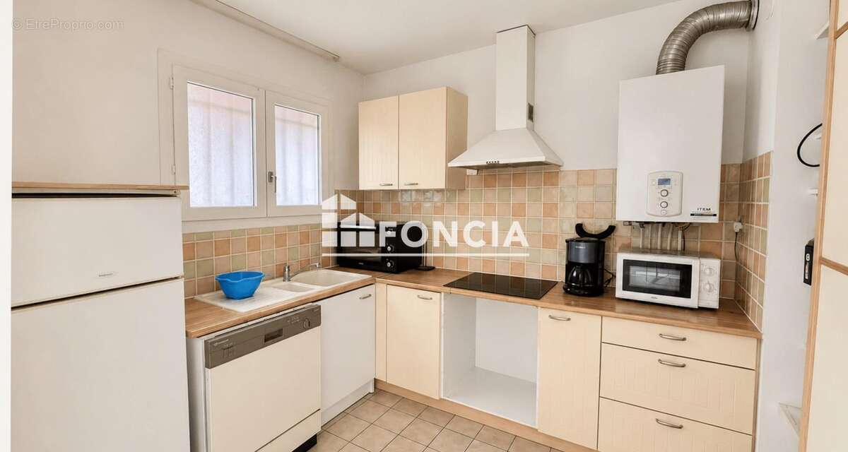 Béziers – T3 de 60 m² avec balcon et garage, vendu loué avec rendement de 6,7 % - photo 3
