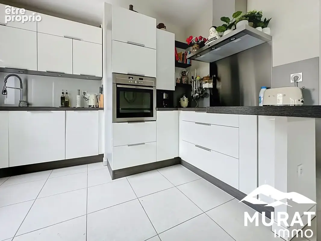 Appartement 4 pièces 98 m² à vendre à Chamalieres (63400) - photo 5