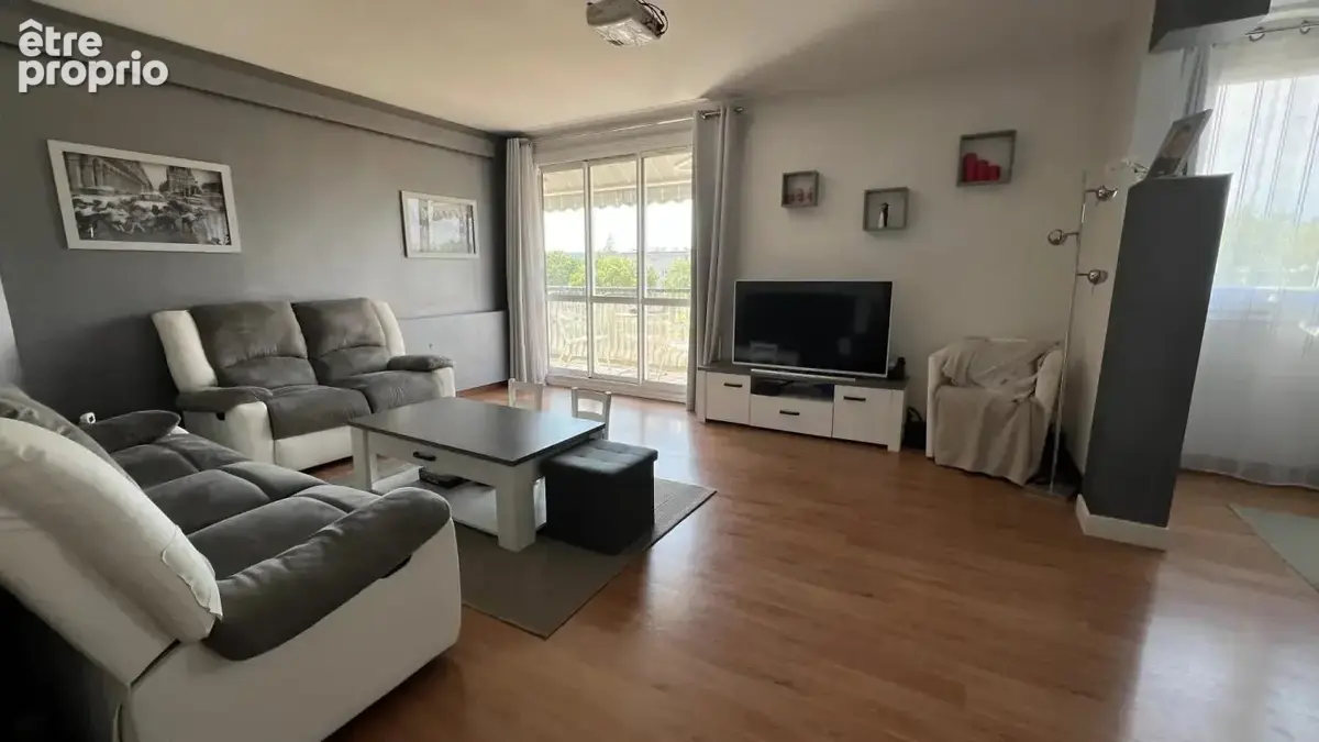 Sejour 30 m² balcon sud 3 chambres - photo 3