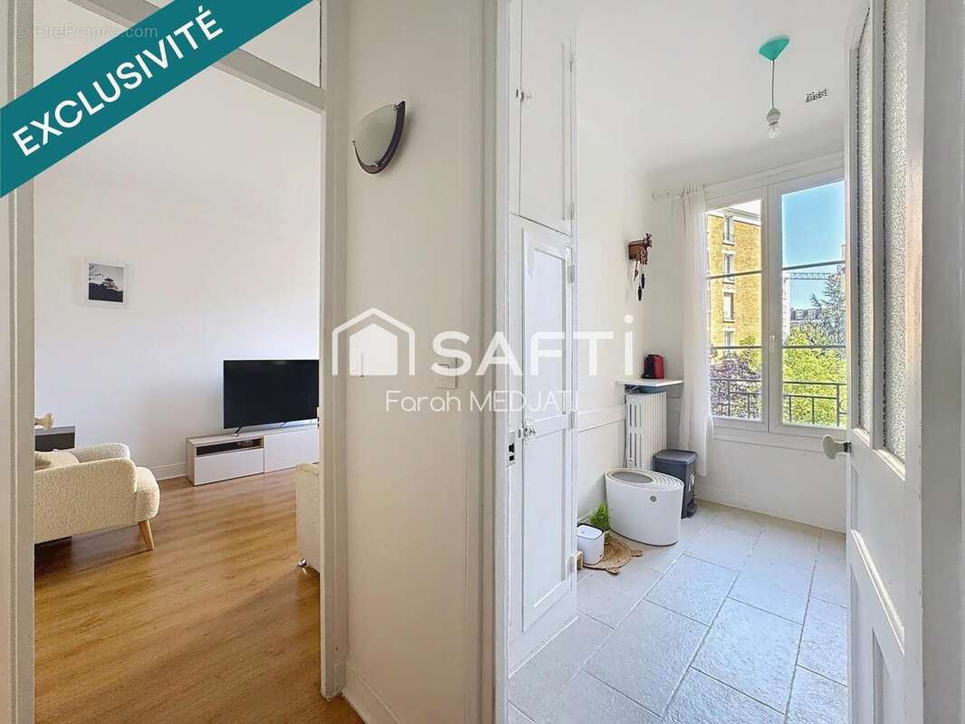 Photo 5 - Appartement à COURBEVOIE