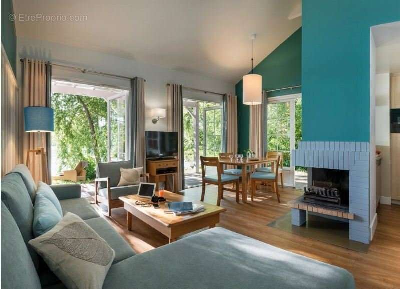 INVESTISSEMENT LOCATIF  CHAMOUILLE  Résidence de tourisme Center Parcs Le Lac d'Ailette - 6.52% de rentabilité - photo 2