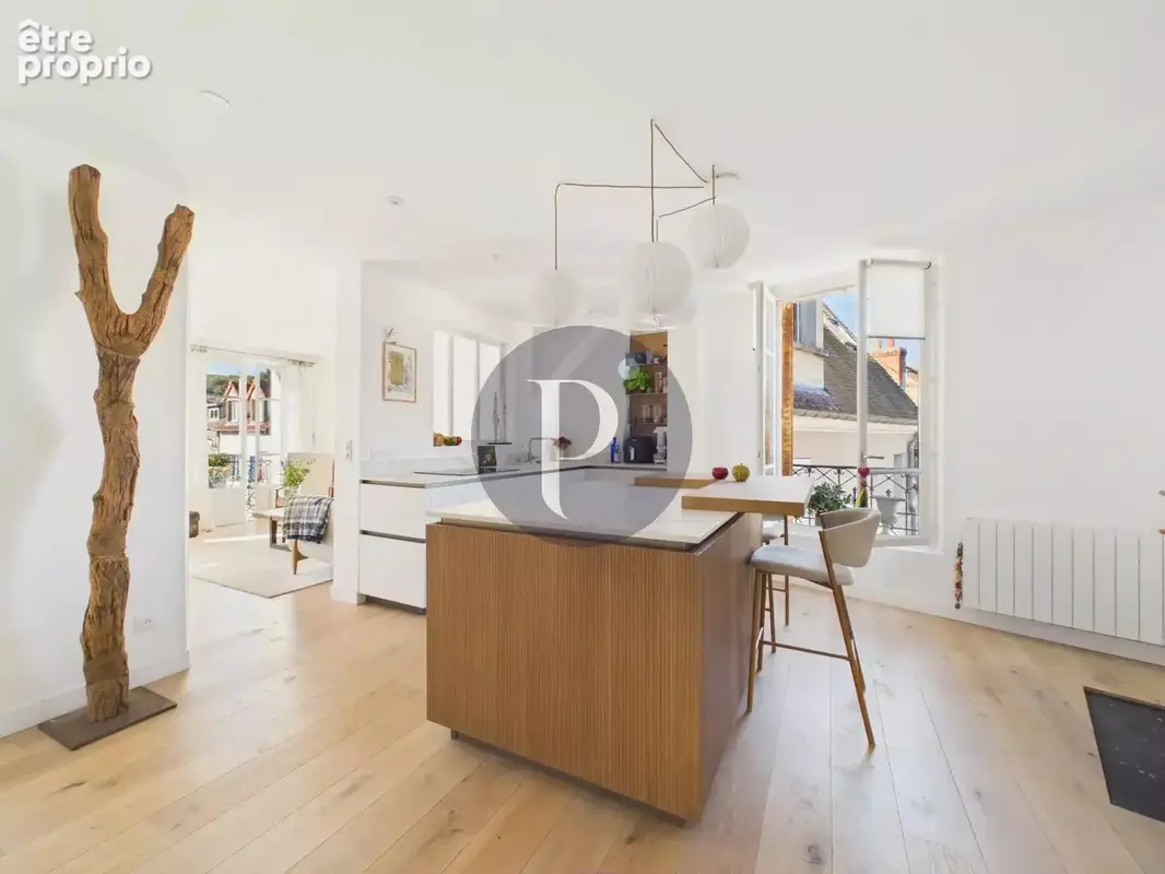 La surprise sous les toits : duplex style loft exceptionnel. - photo 7