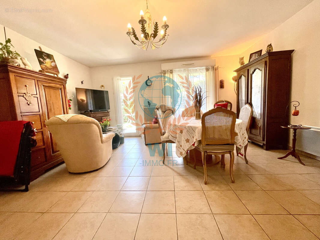 Appartement  en rez-de-jardin avec piscine et garage - photo 3