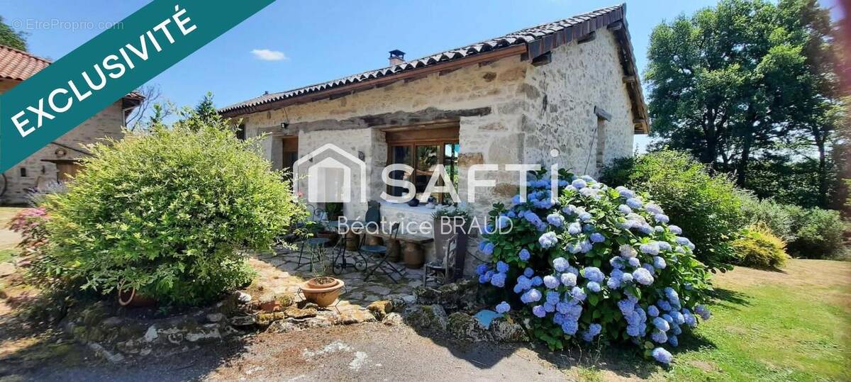 Photo 1 - Maison à LES SALLES-LAVAUGUYON