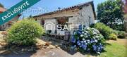 Photo 1 - Maison à LES SALLES-LAVAUGUYON
