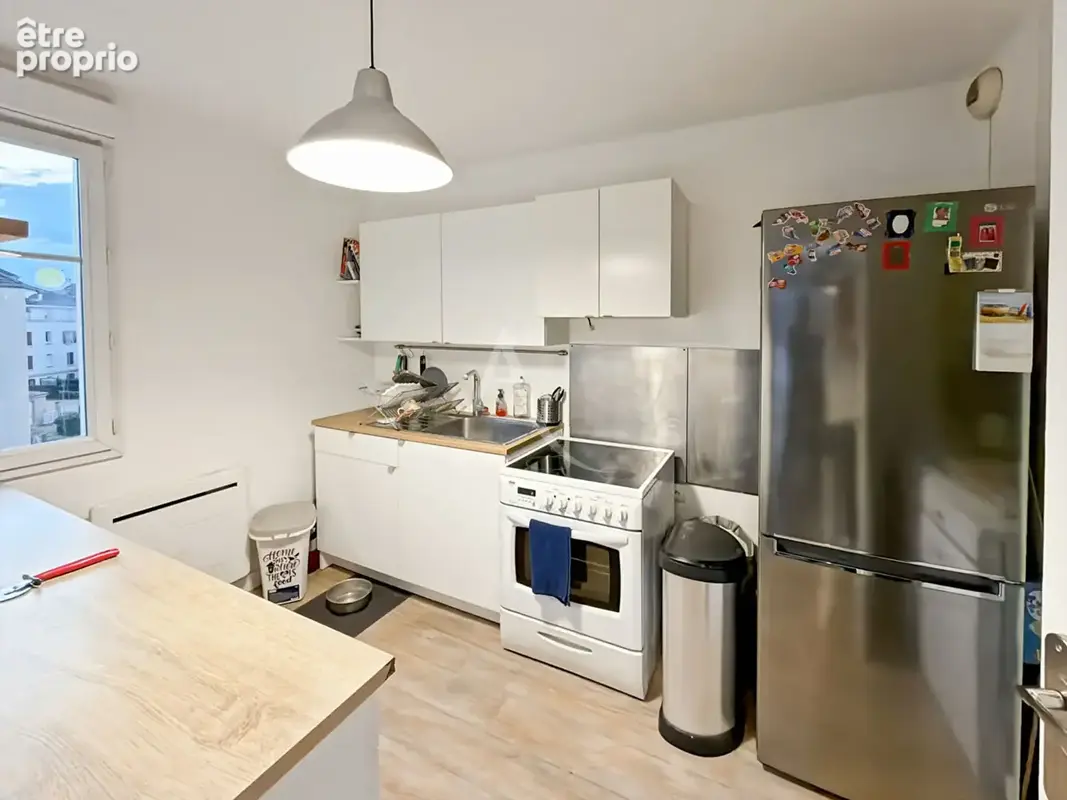 Appartement Vaureal  F5 en DUPLEX  au COEUR DE VILLE  de 75 m2 avec 43 m2 de terrasse et 2 places de parking en sous sol. - photo 5