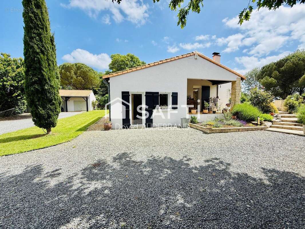 Photo 2 - Maison à VOUILLE