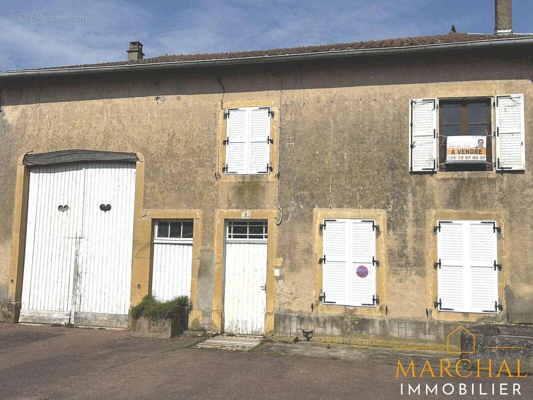 Maison à SERVIGNY-LES-SAINTE-BARBE