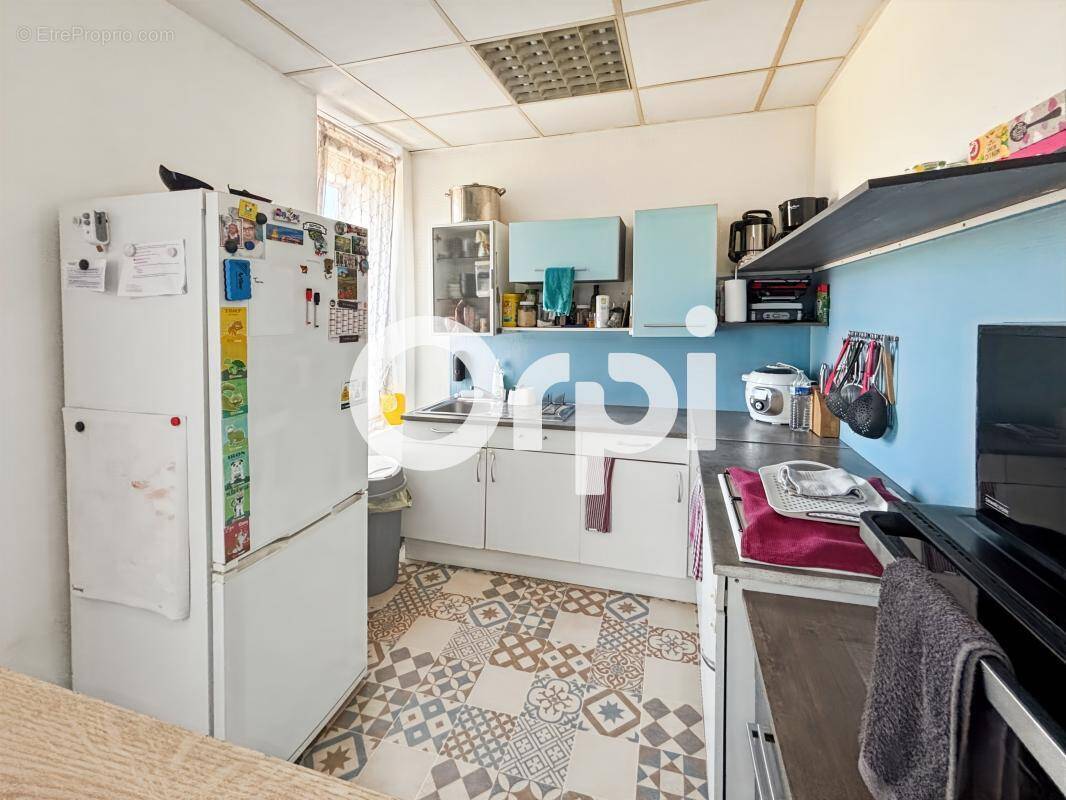 Immeuble mixte à usage d'habitation et de commerce à Cappelle-la-Grande (59180) - photo 3